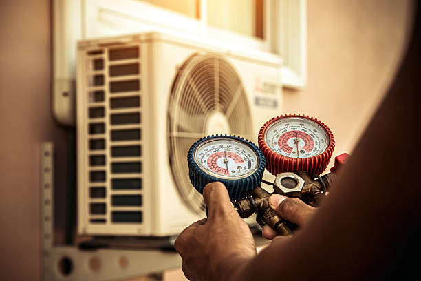 Professional Air Conditioning Service technician working in Yorkville, NY